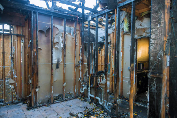 Professional Fire Damage Restoration technician working in Dresser, WI